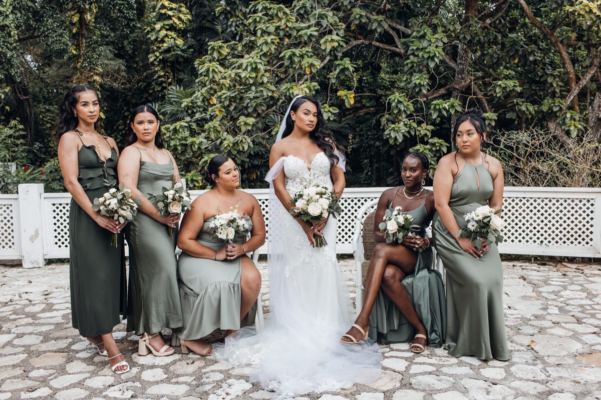 Real Jamaica wedding party gathered in a tropical setting